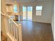 Bright living room with tile floors and access to kitchen and backyard at 4771 Illustria Ave, Las Vegas, NV 89141