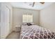 Bedroom with double closets and ceiling fan at 5064 Sacred Datura Ave, Las Vegas, NV 89139