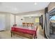 Open dining area with wood table and bench seating for six at 5064 Sacred Datura Ave, Las Vegas, NV 89139