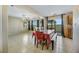 Dining area with a wooden table and access to the patio at 5064 Sacred Datura Ave, Las Vegas, NV 89139