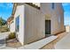 View of the home's side entrance and walkway at 5064 Sacred Datura Ave, Las Vegas, NV 89139