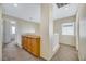 Upstairs hallway with built-in storage and access to bedrooms at 5064 Sacred Datura Ave, Las Vegas, NV 89139