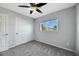 Bedroom with double door closet and window at 5332 Iron Crossing Ave, Las Vegas, NV 89131