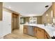 Modern kitchen island with marble countertops and stainless steel appliances at 5332 Iron Crossing Ave, Las Vegas, NV 89131