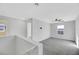 Bright loft bedroom with window, ceiling fan, and carpet at 5332 Iron Crossing Ave, Las Vegas, NV 89131