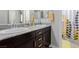 Double vanity bathroom with granite countertop at 10440 Irish Cliffs Ct, Las Vegas, NV 89149