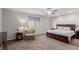 Spacious bedroom with plush carpet and large bed at 10440 Irish Cliffs Ct, Las Vegas, NV 89149