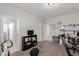 Home office with desk, exercise equipment, and built-in shelves at 10440 Irish Cliffs Ct, Las Vegas, NV 89149