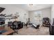 Home office with a workspace, exercise equipment, and bookshelves at 10440 Irish Cliffs Ct, Las Vegas, NV 89149