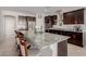 Modern kitchen with granite countertops and stainless steel appliances at 10440 Irish Cliffs Ct, Las Vegas, NV 89149