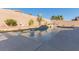 Inviting swimming pool with surrounding patio at 10440 Irish Cliffs Ct, Las Vegas, NV 89149