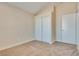 Bedroom with double door closet and carpet flooring at 3706 Rose Canyon Dr, North Las Vegas, NV 89032