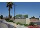 View of the Meadows Mall sign showcasing modern design and desert-friendly landscaping at 4709 W Alpine Pl, Las Vegas, NV 89107