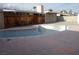 An in-ground pool in a yard with a privacy fence at 4709 W Alpine Pl, Las Vegas, NV 89107