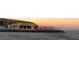 Home under construction with framing in progress, set against a scenic cityscape at sunrise at 495 Cityview Ridge Dr, Henderson, NV 89012