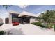 Contemporary home showcasing the garage and driveway with landscaping at 495 Cityview Ridge Dr, Henderson, NV 89012