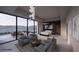 Bright living room offering comfortable seating, access to an outdoor patio, and modern design at 495 Cityview Ridge Dr, Henderson, NV 89012
