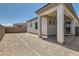 Spacious backyard featuring a covered patio with brick flooring, and privacy walls at 106 Barkset Way, Henderson, NV 89011