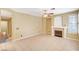 Living room featuring a fireplace, tile floors and ceiling fan at 1708 Jack Rabbit Way, Las Vegas, NV 89128