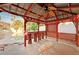 Relaxing backyard gazebo with lattice detail, ceiling fan, and string lights at 1708 Jack Rabbit Way, Las Vegas, NV 89128