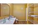 Bright bathroom with a clean vanity, open shelving, and a large mirror, offering both style and function at 2020 Rancho Lake Drive Dr # 205, Las Vegas, NV 89108