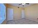 A clean and tidy bedroom with tile flooring, neutral walls and two closets at 2020 Rancho Lake Drive Dr # 205, Las Vegas, NV 89108
