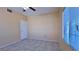 Bedroom featuring tile flooring, a ceiling fan, and natural light from a large window with blinds at 2020 Rancho Lake Drive Dr # 205, Las Vegas, NV 89108