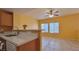 The kitchen features a counter with an eat-in bar, and is open to the living area with great light from the many windows at 2020 Rancho Lake Drive Dr # 205, Las Vegas, NV 89108