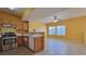 The kitchen boasts stainless steel appliances and is open to the living area with many windows for great natural light at 2020 Rancho Lake Drive Dr # 205, Las Vegas, NV 89108
