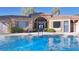 Community pool and spa with adjacent clubhouse at 2020 Rancho Lake Drive Dr # 205, Las Vegas, NV 89108