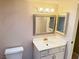 Bright bathroom with updated vanity and mirrored medicine cabinet at 3719 Colonial Dr, Las Vegas, NV 89121