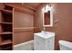 Small bathroom with white vanity and shelving at 3719 Colonial Dr, Las Vegas, NV 89121