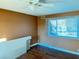 Bright bedroom with wood floors and a large window at 3719 Colonial Dr, Las Vegas, NV 89121