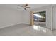 Bedroom with tile floors, ceiling fan, and patio access at 3719 Colonial Dr, Las Vegas, NV 89121