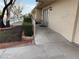 Building exterior with accessible entrance and landscaping at 3719 Colonial Dr, Las Vegas, NV 89121