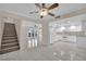 Bright eat-in kitchen with white cabinetry and tile flooring at 3719 Colonial Dr, Las Vegas, NV 89121