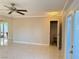 Living room with tile floors, a closet, and patio doors at 3719 Colonial Dr, Las Vegas, NV 89121