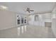 Spacious living room with tile floors and built-in shelving at 3719 Colonial Dr, Las Vegas, NV 89121