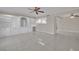 Spacious living room with tile floors and built-in shelving at 3719 Colonial Dr, Las Vegas, NV 89121