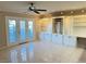 Living room with built-in shelving and a view to the patio at 3719 Colonial Dr, Las Vegas, NV 89121