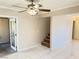 Living room featuring tile floors and stairs to upper level at 3719 Colonial Dr, Las Vegas, NV 89121