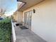 Small patio with double doors leading to the interior of the home at 3719 Colonial Dr, Las Vegas, NV 89121