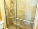 Clean shower with tiled walls and glass enclosure at 3719 Colonial Dr, Las Vegas, NV 89121