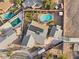 Bird's eye view of a house with a pool and surrounding homes at 4767 Del Sueno Dr, Las Vegas, NV 89120