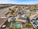 Aerial view of single story home with pool and solar panels, nestled in a quiet neighborhood at 4767 Del Sueno Dr, Las Vegas, NV 89120