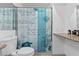 Bathroom with granite countertop, toilet and teal shower curtain at 4767 Del Sueno Dr, Las Vegas, NV 89120