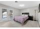 Bedroom with french doors leading to the backyard and a double bed at 4767 Del Sueno Dr, Las Vegas, NV 89120