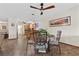 Charming dining area with a round table and four ornate chairs at 4767 Del Sueno Dr, Las Vegas, NV 89120