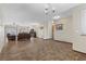 Dining area with tile flooring, and view into living room at 4767 Del Sueno Dr, Las Vegas, NV 89120