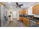 Kitchen with stainless steel appliances and wood cabinets at 4767 Del Sueno Dr, Las Vegas, NV 89120